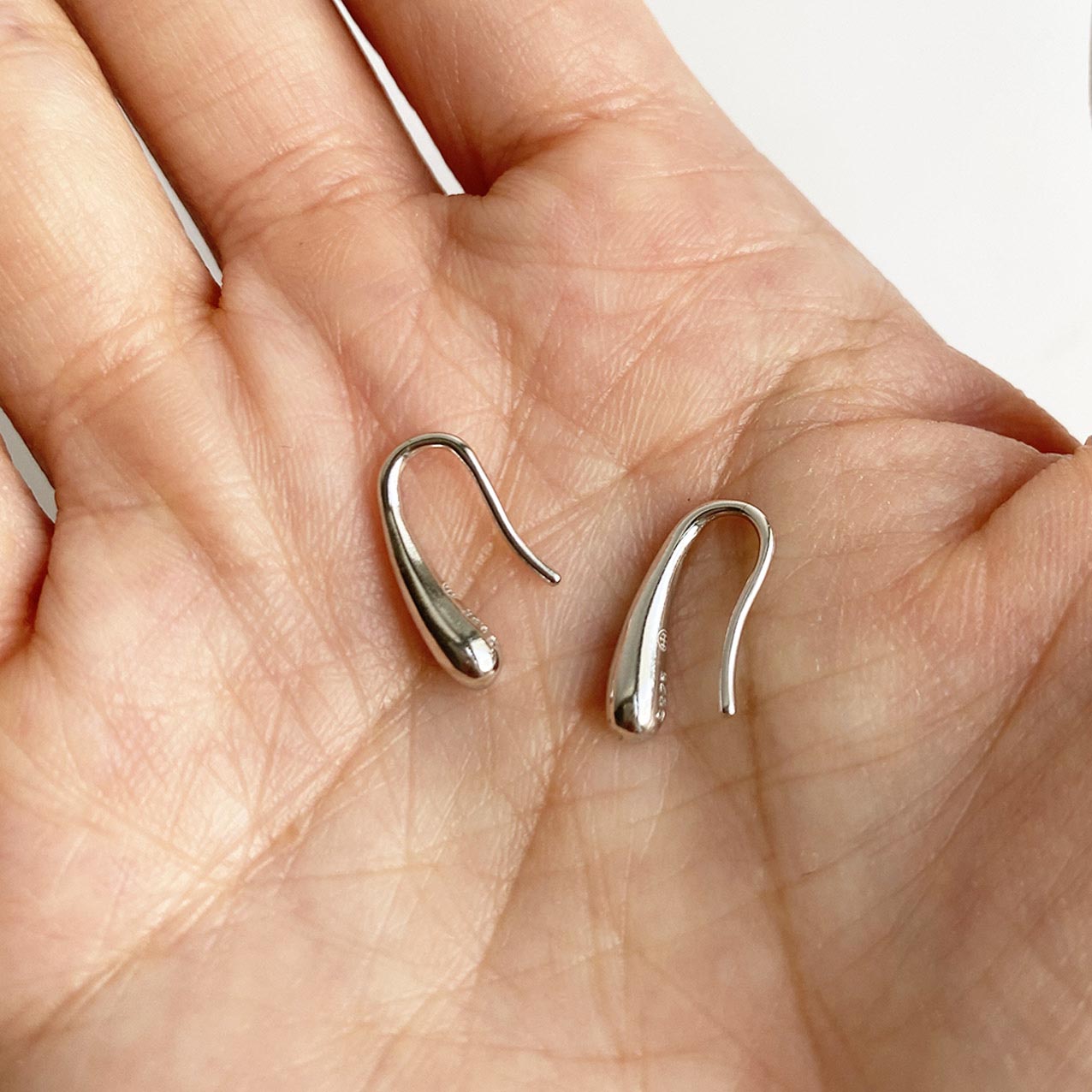 drop earrings 18k white gold plated sterling silver on hand