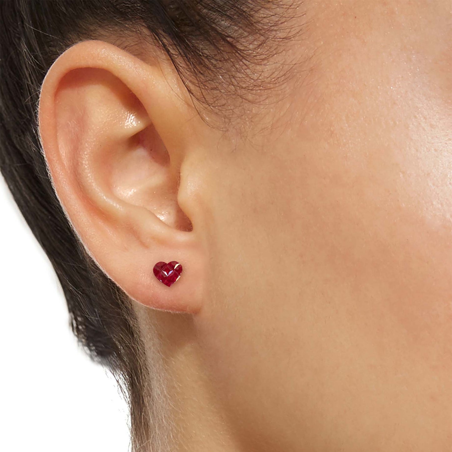 1ct ruby by heart earrings 18k gold on ear