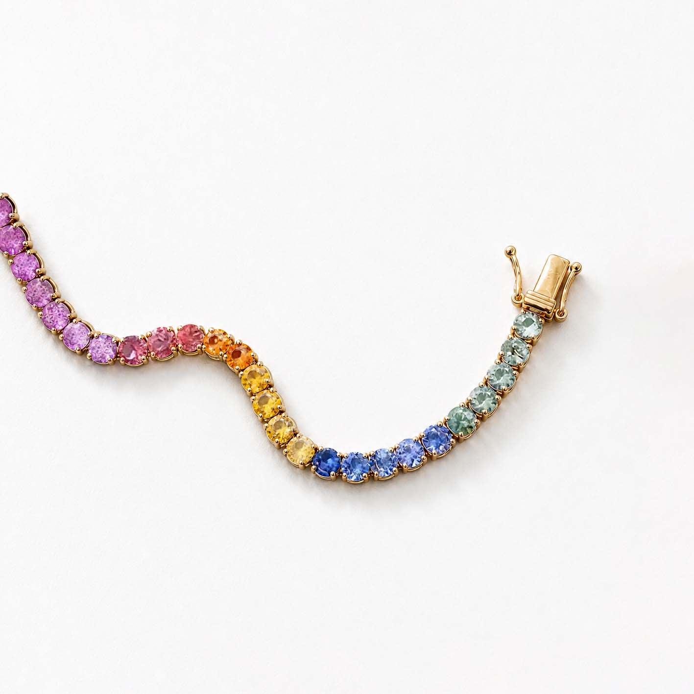 one of a kind 7.8ct rainbow sapphire tennis bracelet in 18k gold