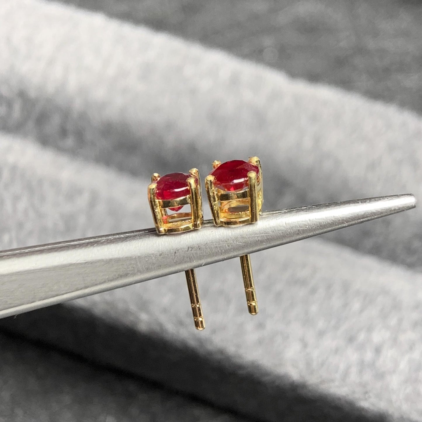 single tulip oval ruby earrings 18k gold side