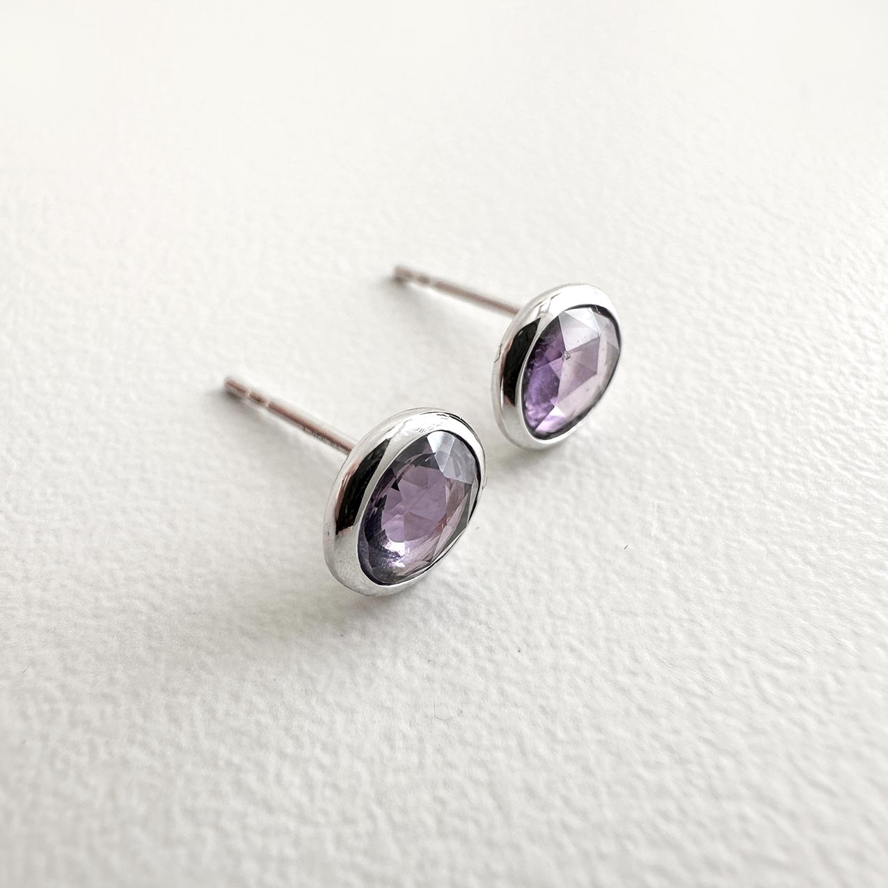 love more purple sapphire earrings 18k white gold side view