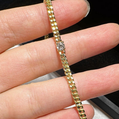 ooak 0.25ctround diamond cuban link bracelet in 18k gold on hand