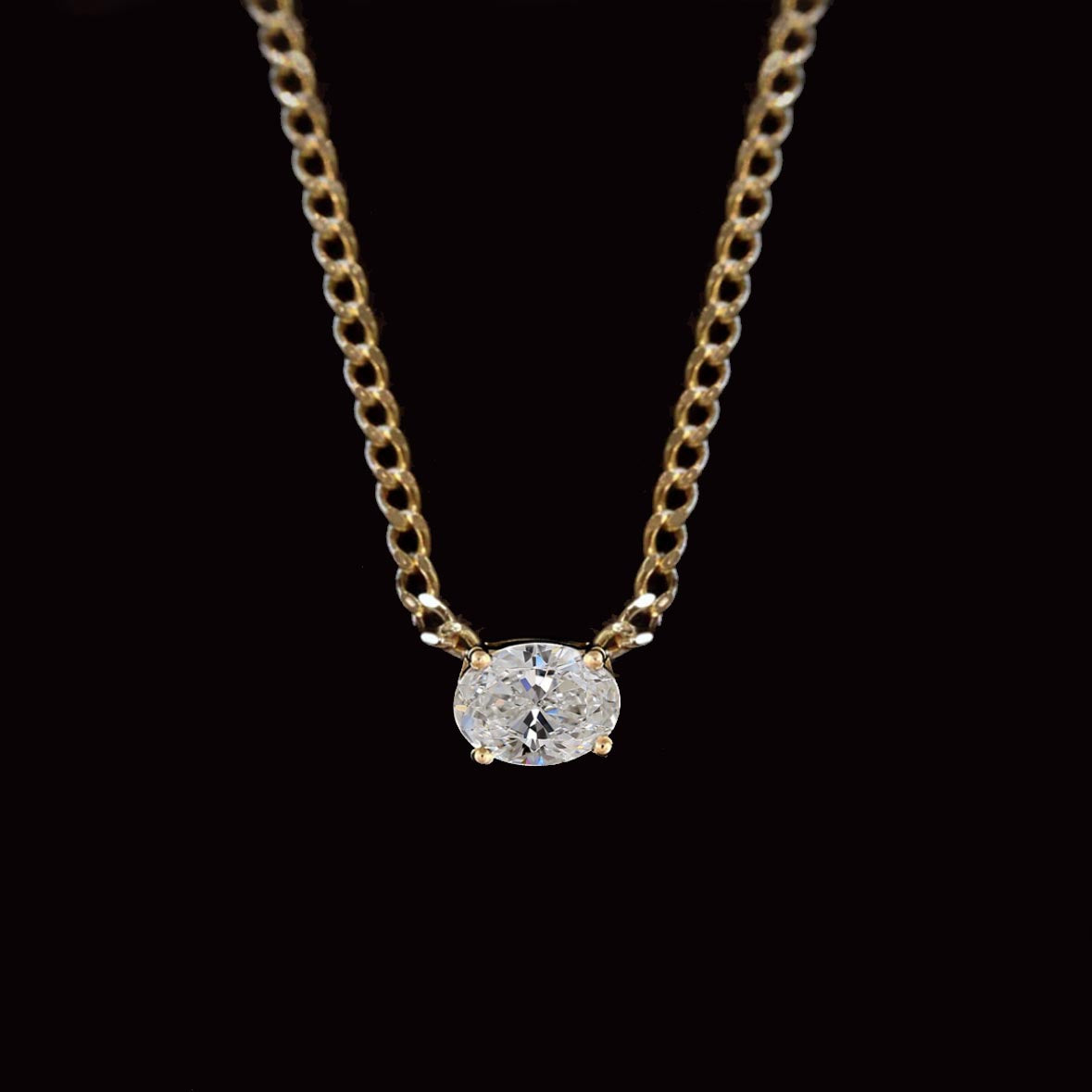 0.20ct oval diamond cuban link necklace in 18k gold