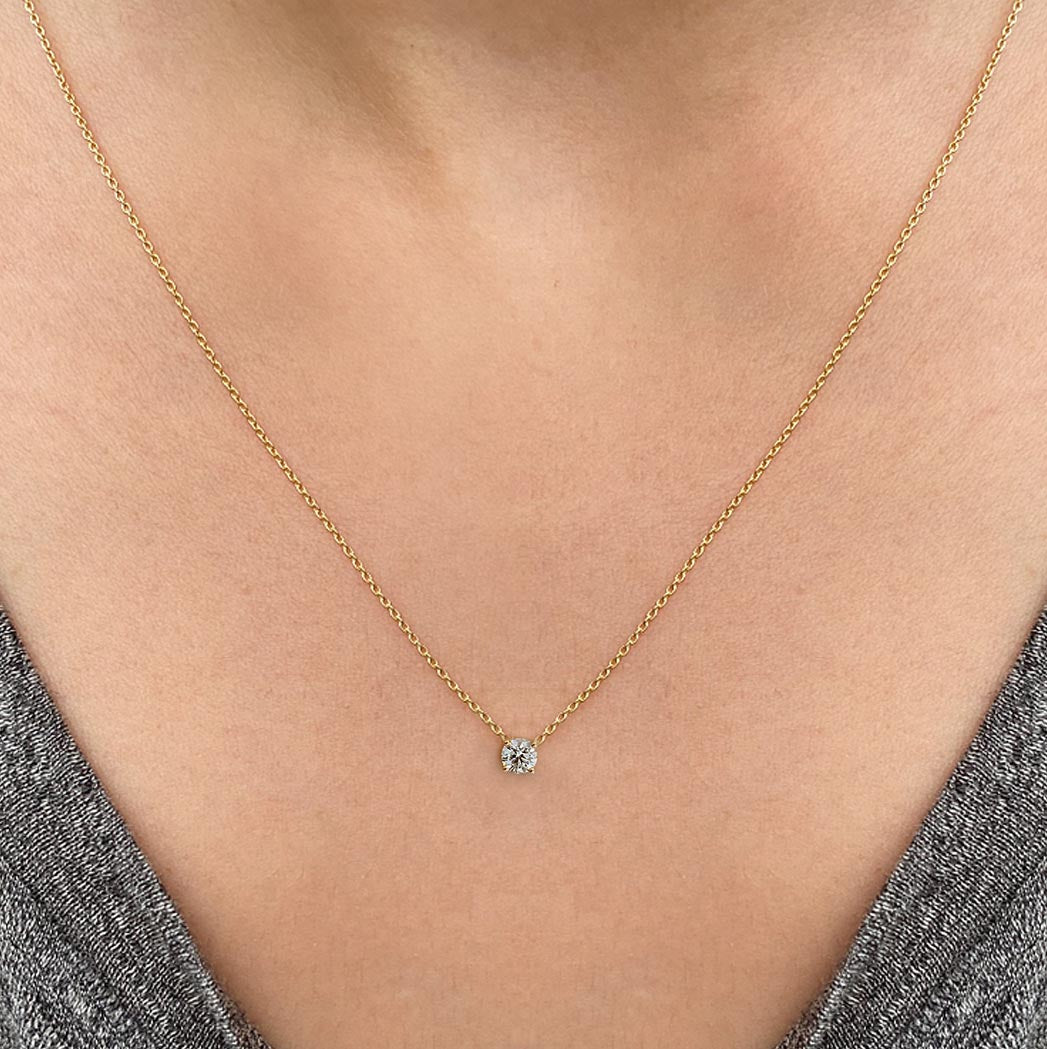 embrace 0.12ct diamond necklace in 18k gold on neck