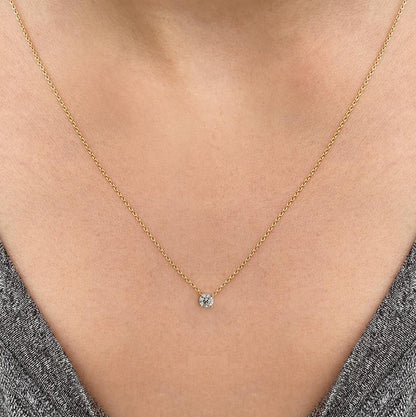 embrace 0.12ct diamond necklace in 18k gold on neck