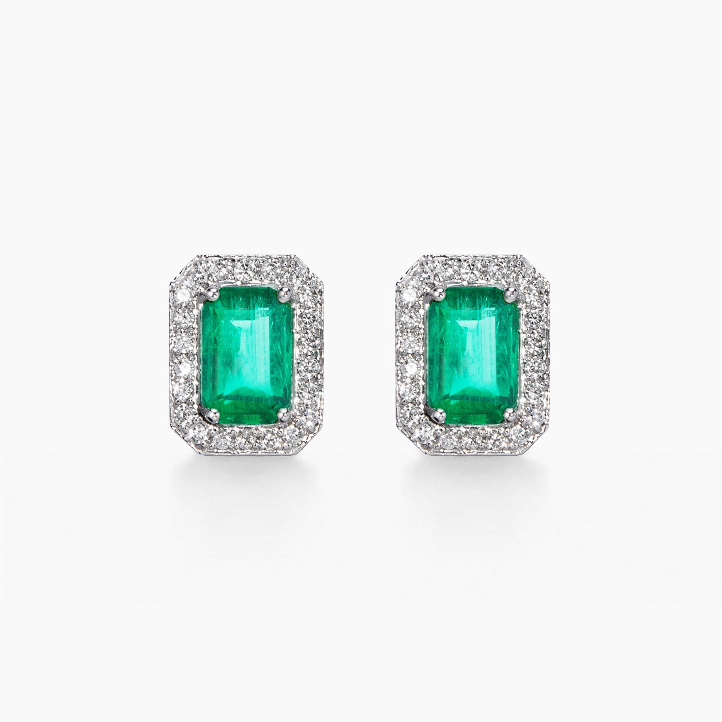 1.2ct emerlad diamond halo earrings in 18k white gold