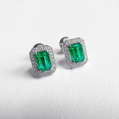 1.2ct emerlad diamond halo earrings in 18k white gold