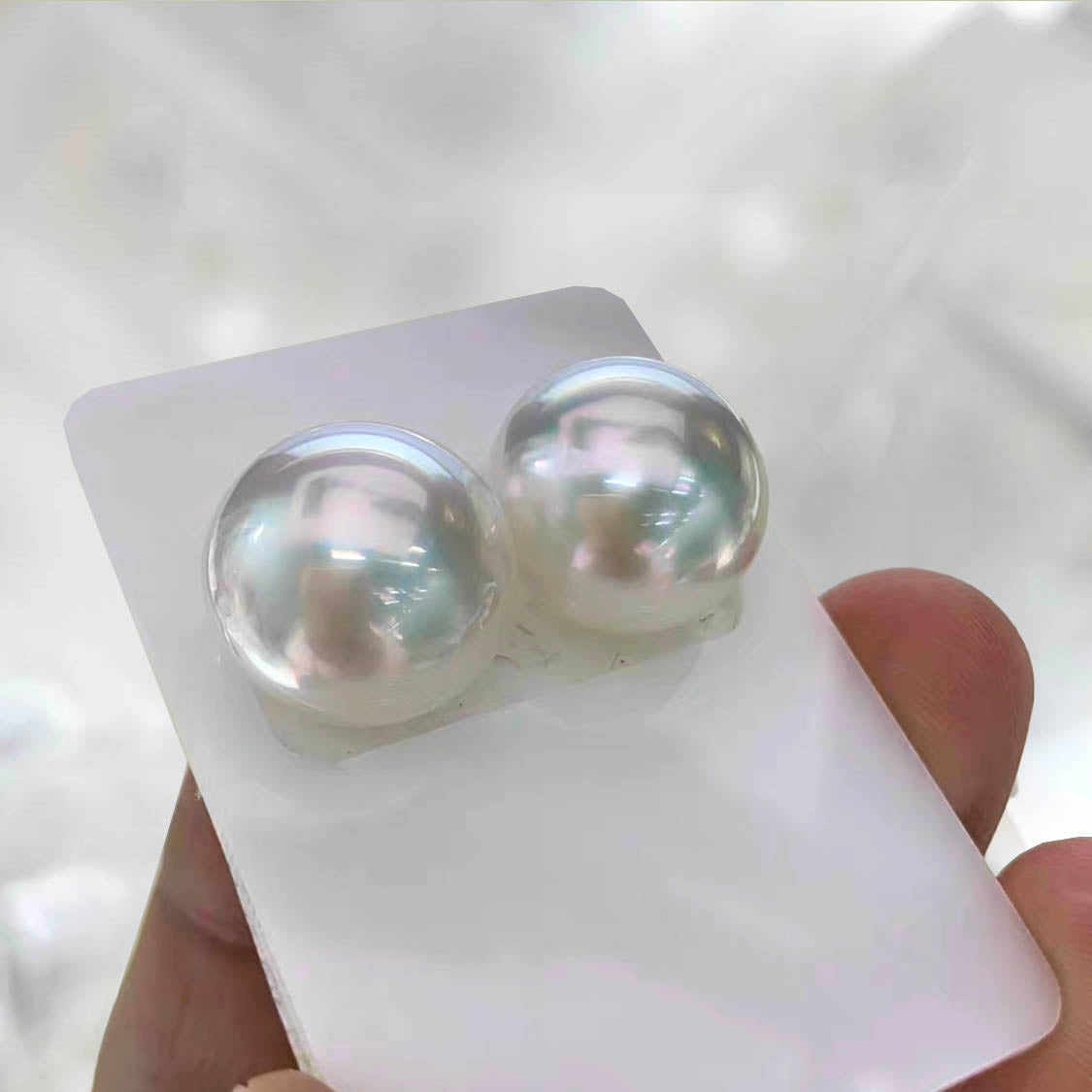 12mm south sea white pearl earrings in 18k gold