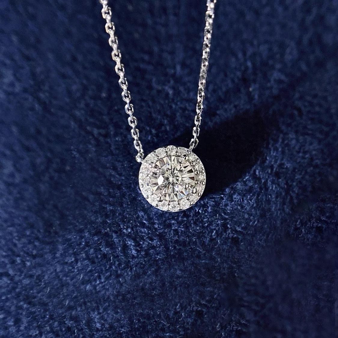 embrace 0.15ct round halo diamond necklace in 18k white gold