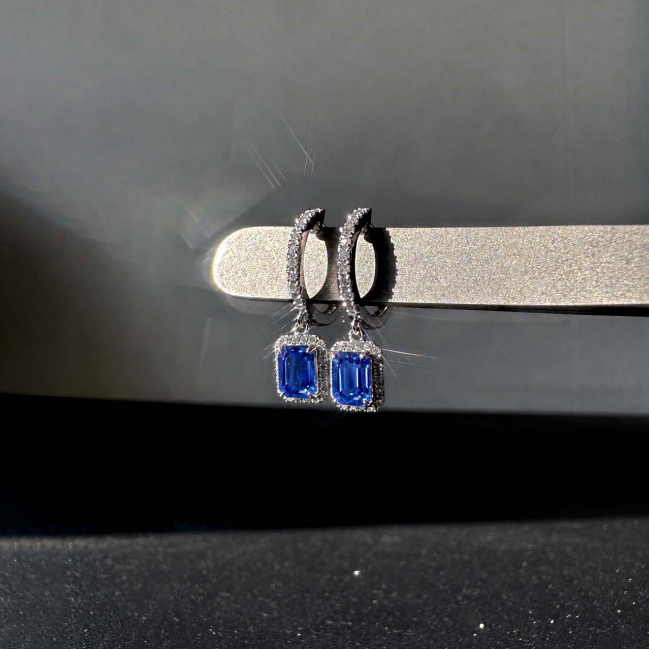 1.7ct sapphire and diamond drop earrings in 18k white gold side view