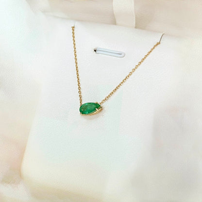 1ct pear cut emerald necklace in 18k gold side