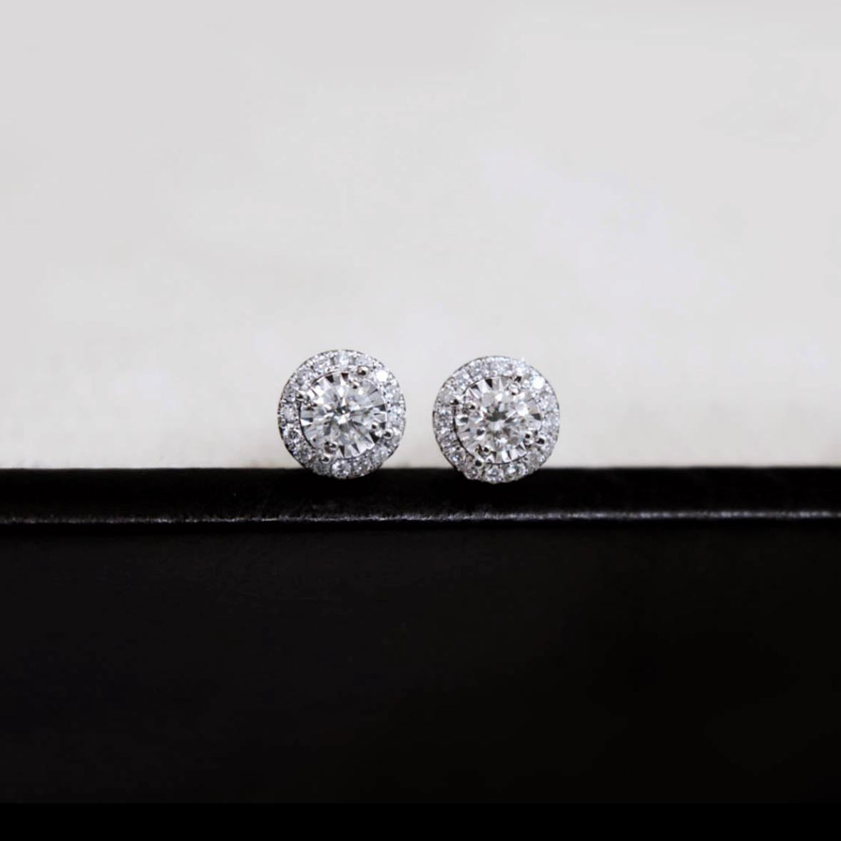 0.3ct round diamond halo earrings in 18k white gold