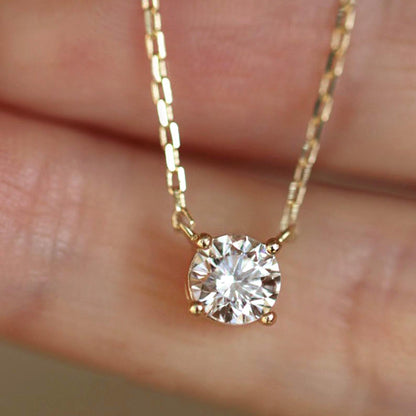 embrace 0.5ct diamond necklace in 18k gold on hand