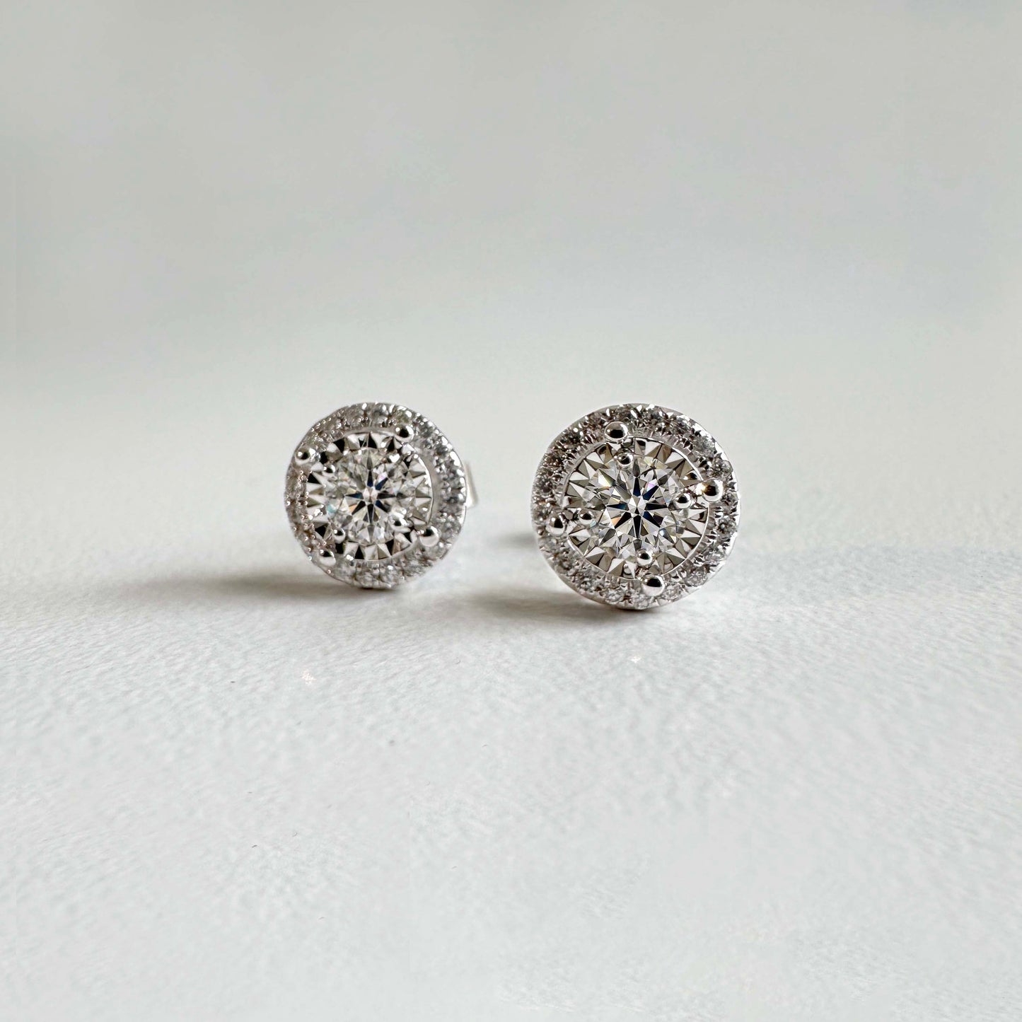 embrace 0.5ct round diamond halo earrings in 18k white gold