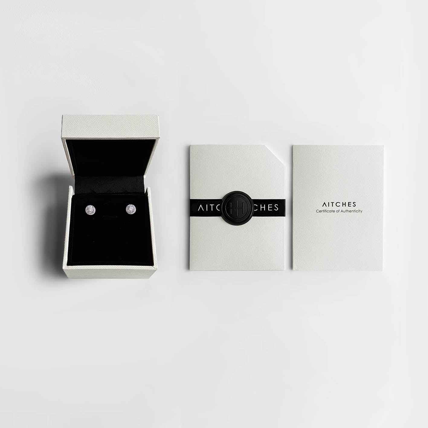 embrace 0.5ct round diamond halo earrings in aitches gift box