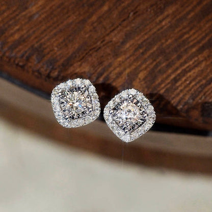 0.54ct cushion diamond halo earriings in 18k white gold