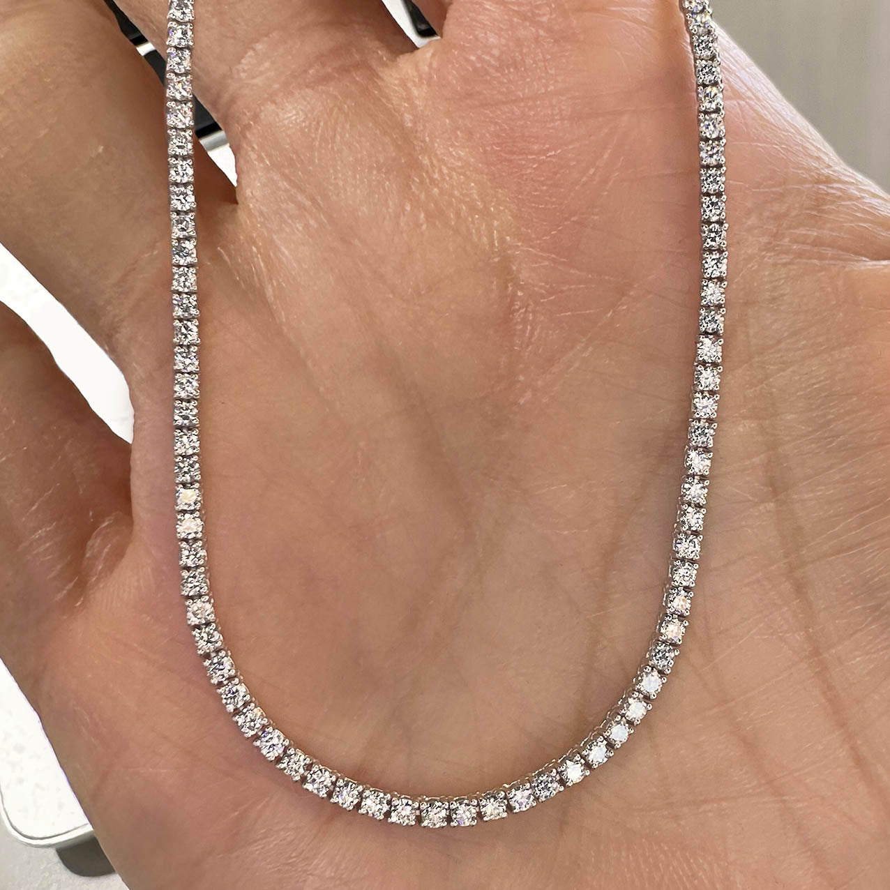 embrace 5ct diamond tennis necklace 18k white gold on hand