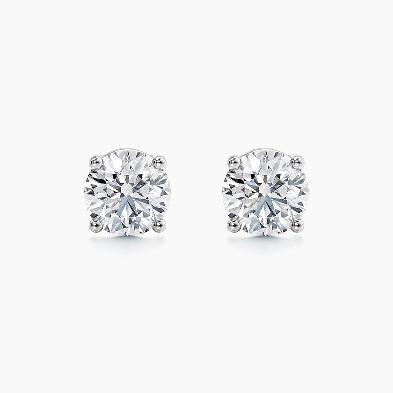 0.6ct diamond stud earrings in 18k white gold