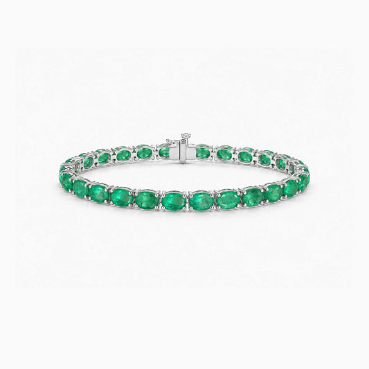 8.0ct oval cut emerald tennis bracelet in 18k white gold