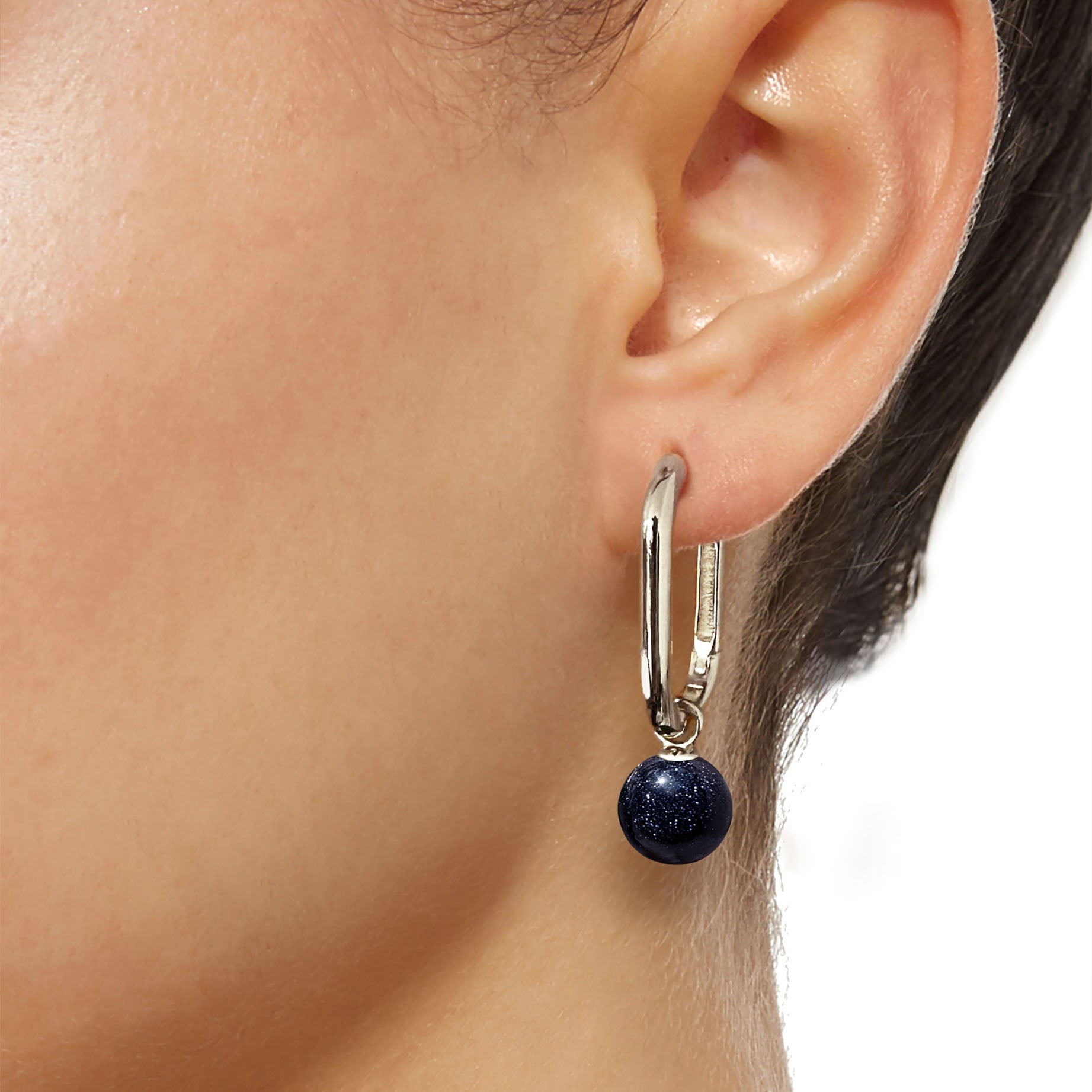 jullie blue sand drop earrings in 18k white gold plated sterling silver on model