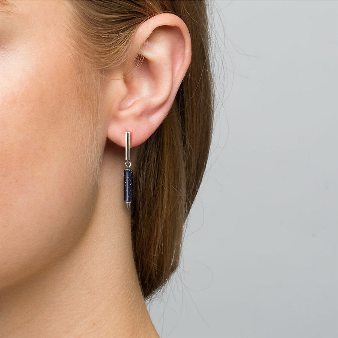 jullie blue sand stick earrings in 18k white gold plated sterling silver on ear