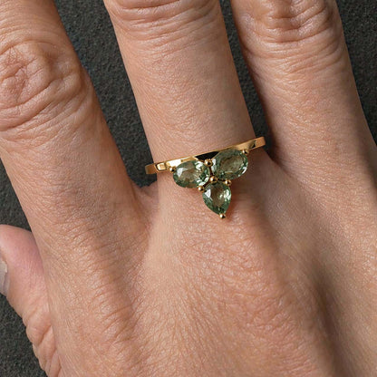 eden green sapphire ring in 18k gold on model