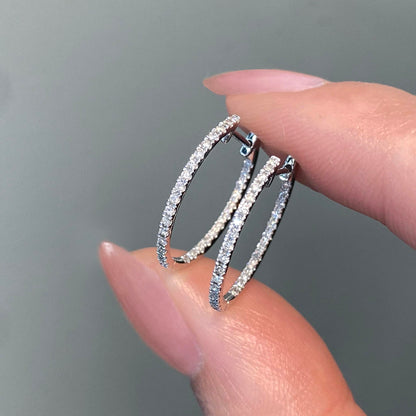 embrace 0.6ct diamond hoop earring in 18k white gold on hand