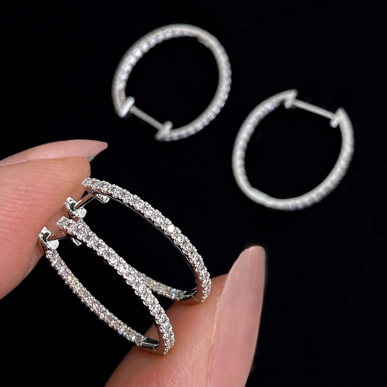 embrace 0.6ct diamond oval hoop earrings in 18k white gold side view