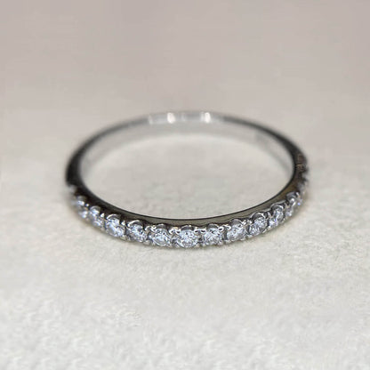 embrace 0.3ct half eternity ring 18k white gold on table