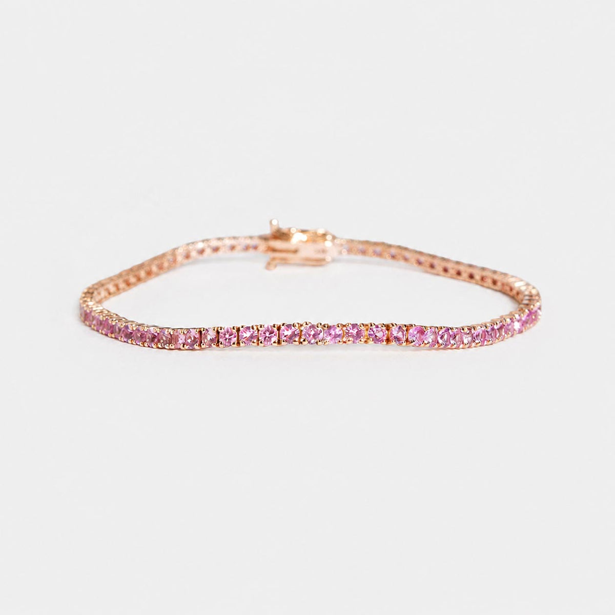 embrace pink sapphire tennis braclet in 18k pink gold