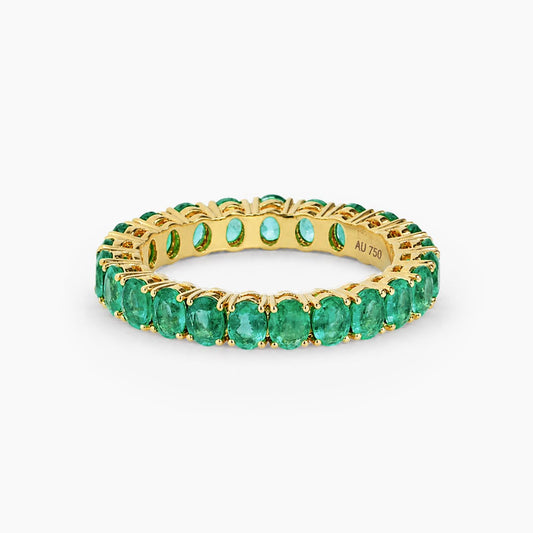 Oval Cut Emerald Eternity Ring in 18K Gold