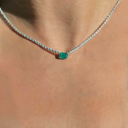 4ct emerald diamond tennis necklact in 18k white gold on neck