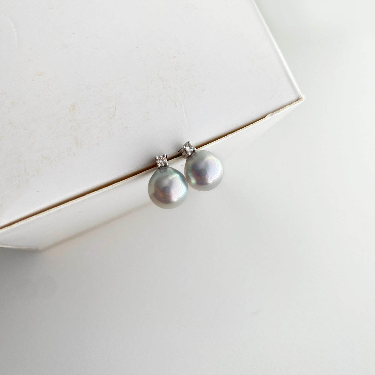 grey akoya pearl diamoon earrings in 18k white gold