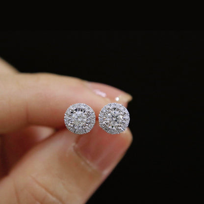 halo diamond earrings 054ct 18k white gold on hand