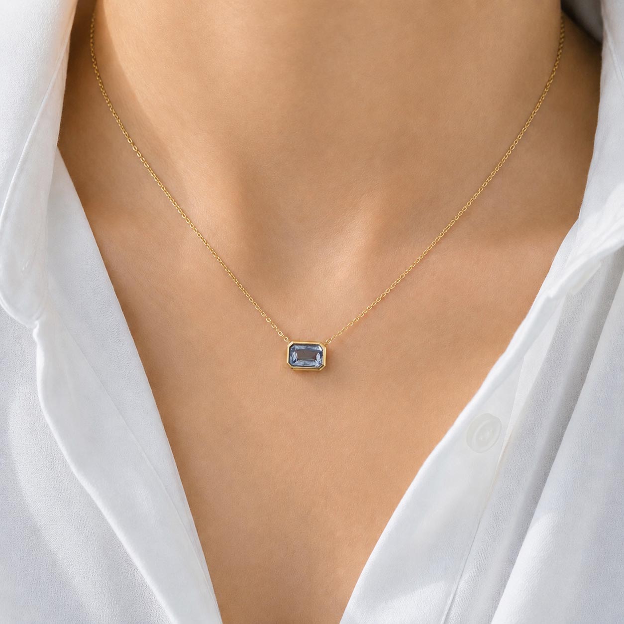 love more bezel ceylon blue sapphire necklace in 18K gold on model
