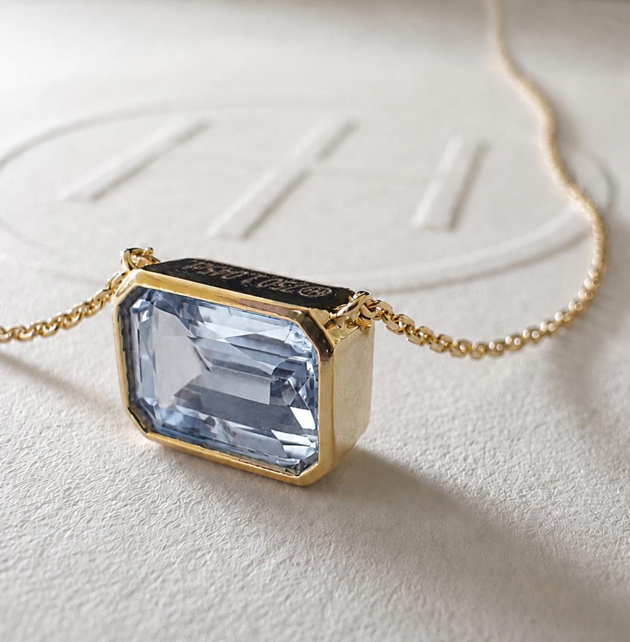 love more bezel ceylon blue sapphire necklace in 18K gold side view