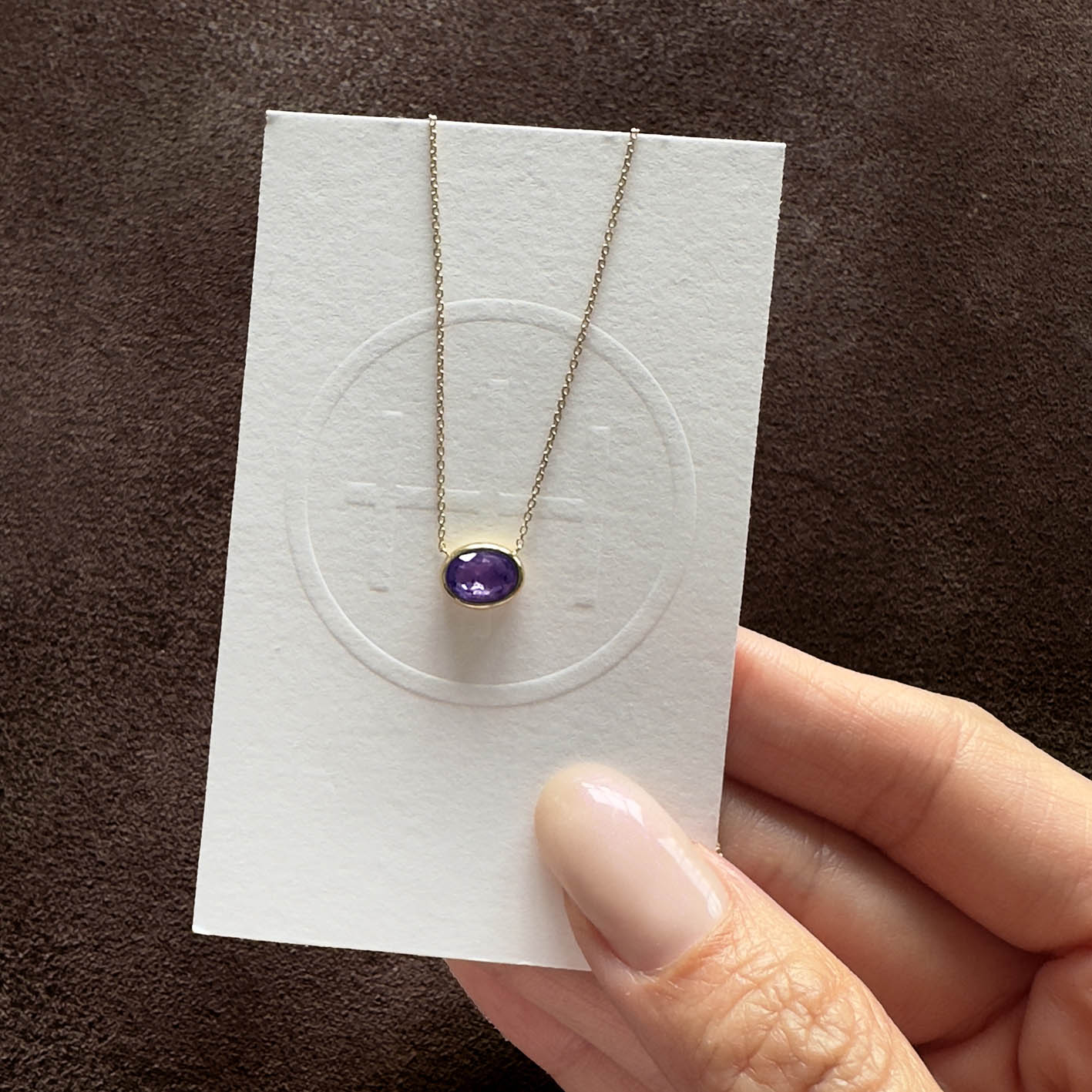 love more bezel set oval purple sapphire necklace in 18k gold zoom out