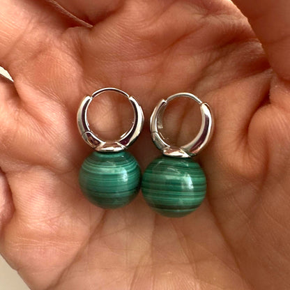 jullie green malachite ball earrings in sterling silver on hand