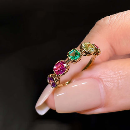 mixed cut colored gemstones ring in 18k gold