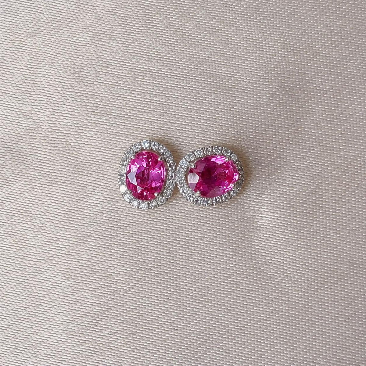 one of a kind 0.91ct pink ruby diamond halo earrings in 18k white gold