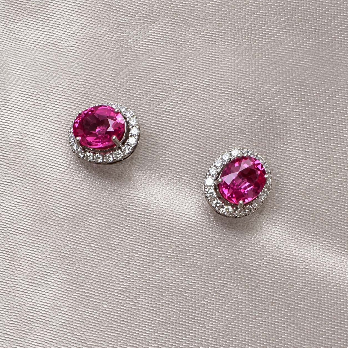 one of a kind 0.91ct pink ruby diamond halo earrings in 18k white gold zoom in