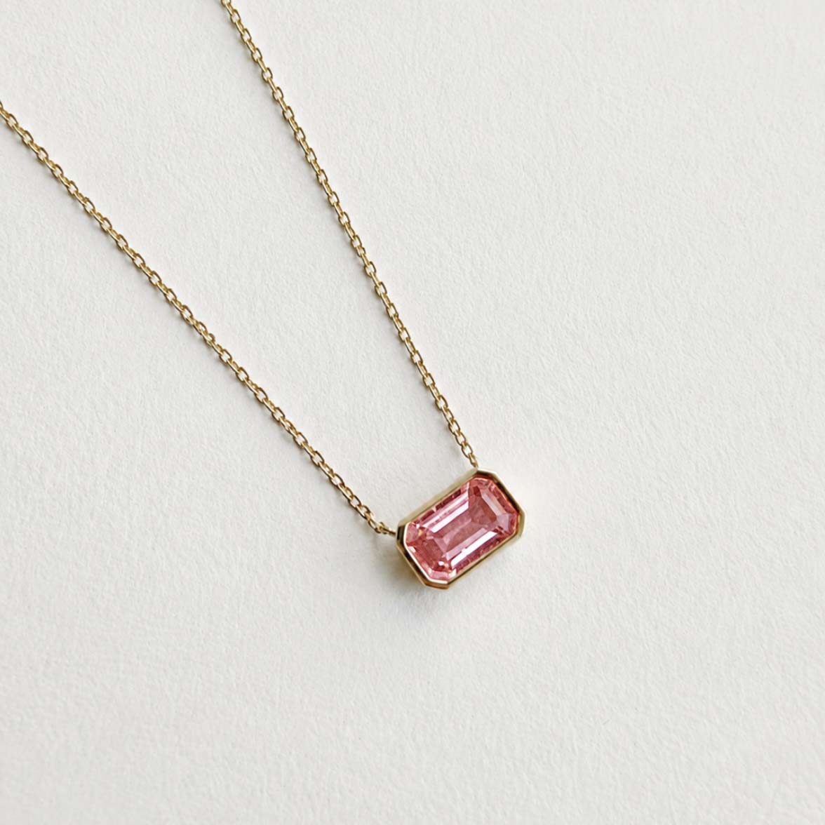 ooak bezel set padparadscha sapphire necklace in 18k gold