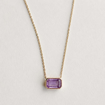 ooak bezel set purple sapphire necklace in 18k gold