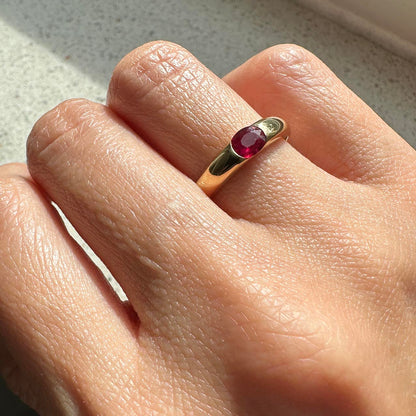 oval ruby ring 18k gold on finger