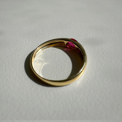 single tulip oval ruby ring in 18k gold back