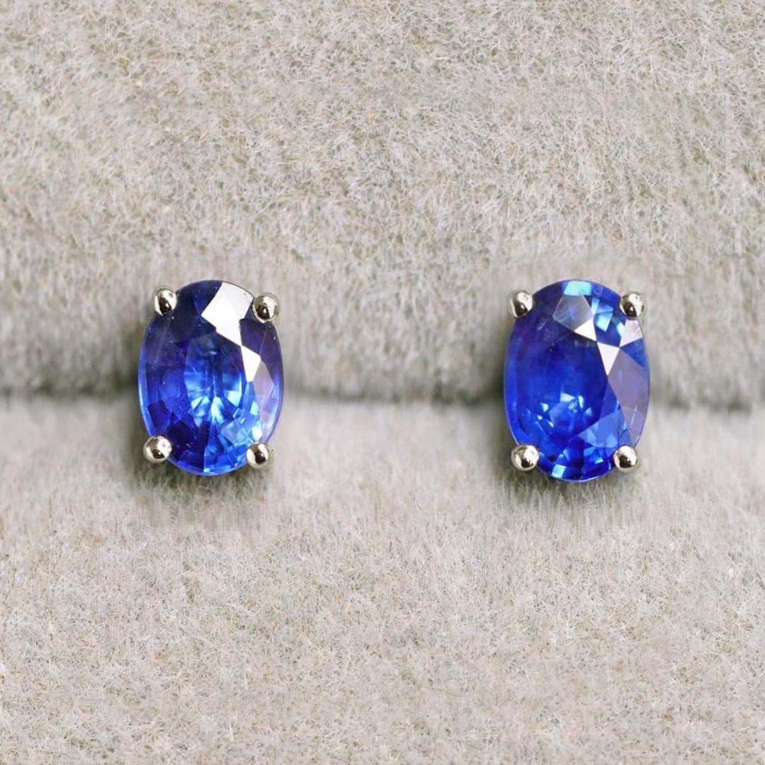 single tulip 1.2ct oval sapphire earrings in 18k white gold