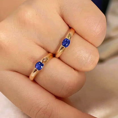 oval sapphire ring 18k gold on hand