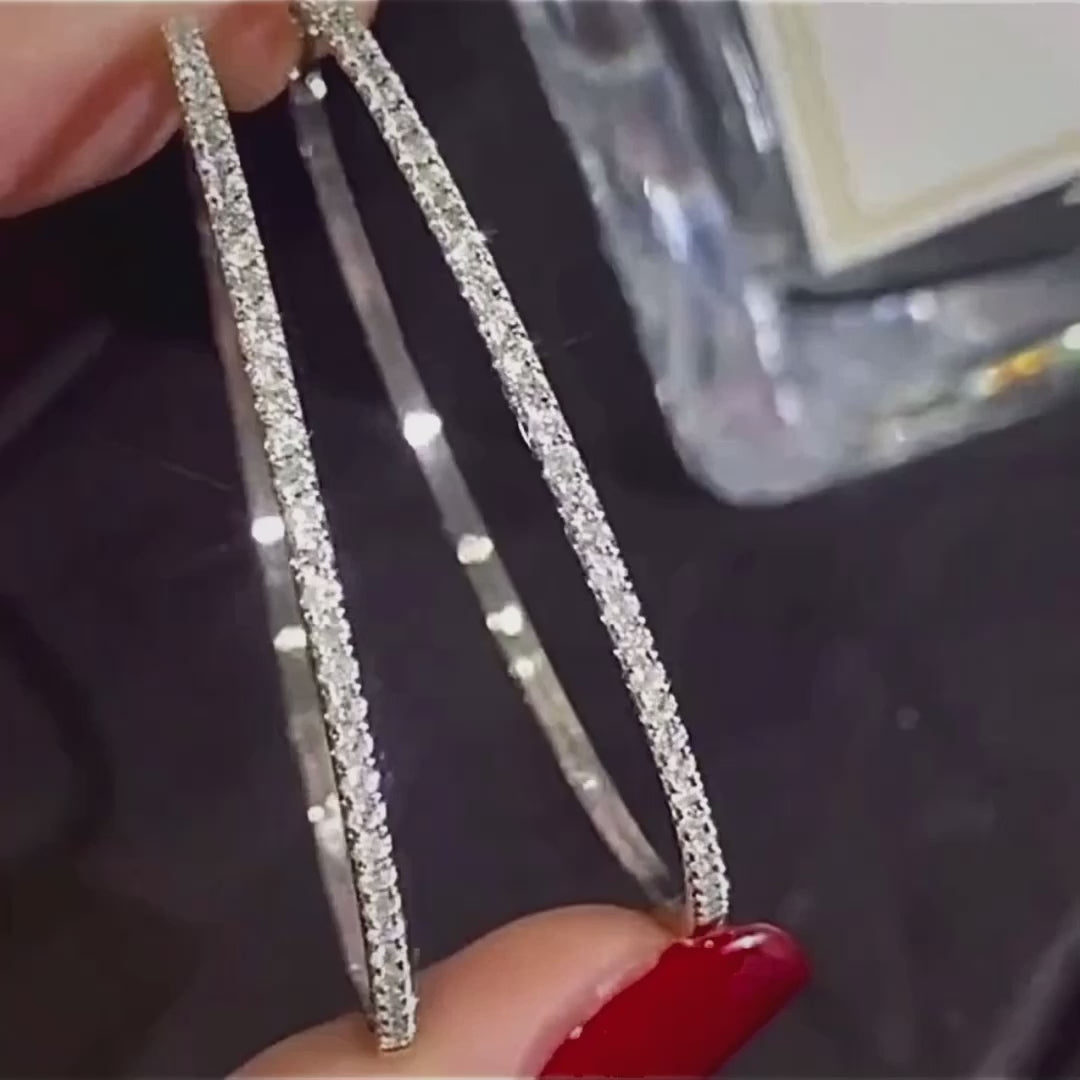 0.6ct diamond hoop earrings in 18k white gold video