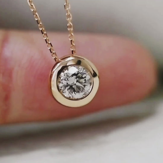 0.15ct diamond bezel necklace in 18k gold video