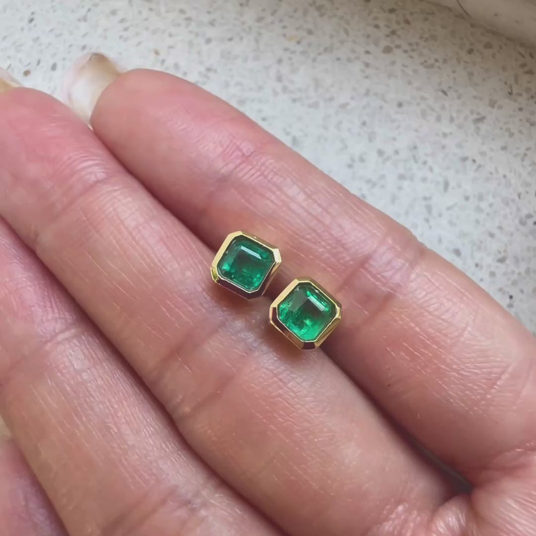 1.01ct bezel set asscher cut emerald earrings in 18k gold video